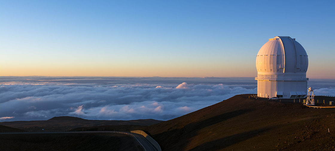 Why is large-scale neutrino observatory in Pacific ocean?