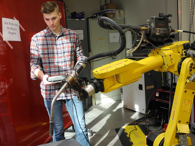 Engineering student upgrades industrial robot to be used for future classes